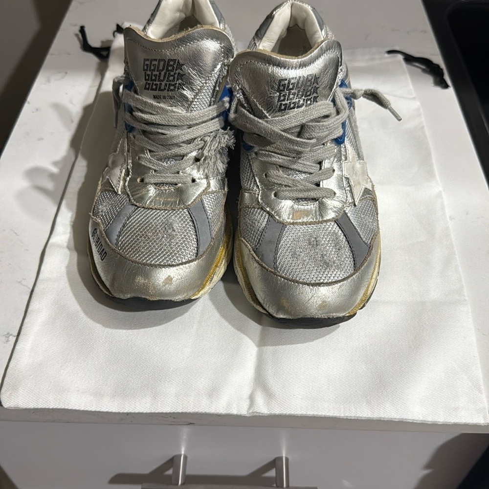 Golden Goose Silver White Athletic Shoes with Supportive Design